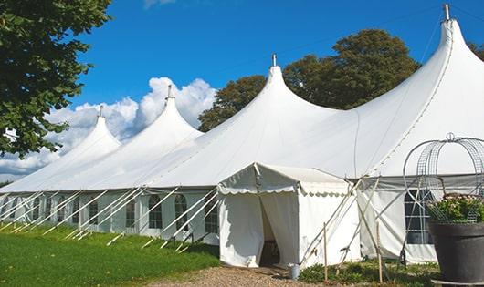 a group of luxury portable restrooms with individual stalls and running water in Atherton